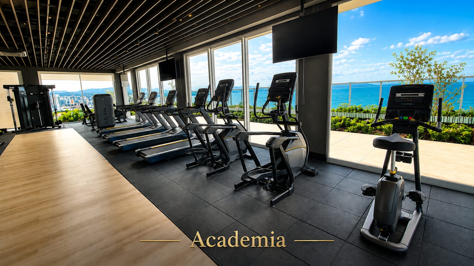 Academia equipada com vista para o mar e incidência de sol da manhã em condomínio no Jardim Atlântico, Florianópolis.