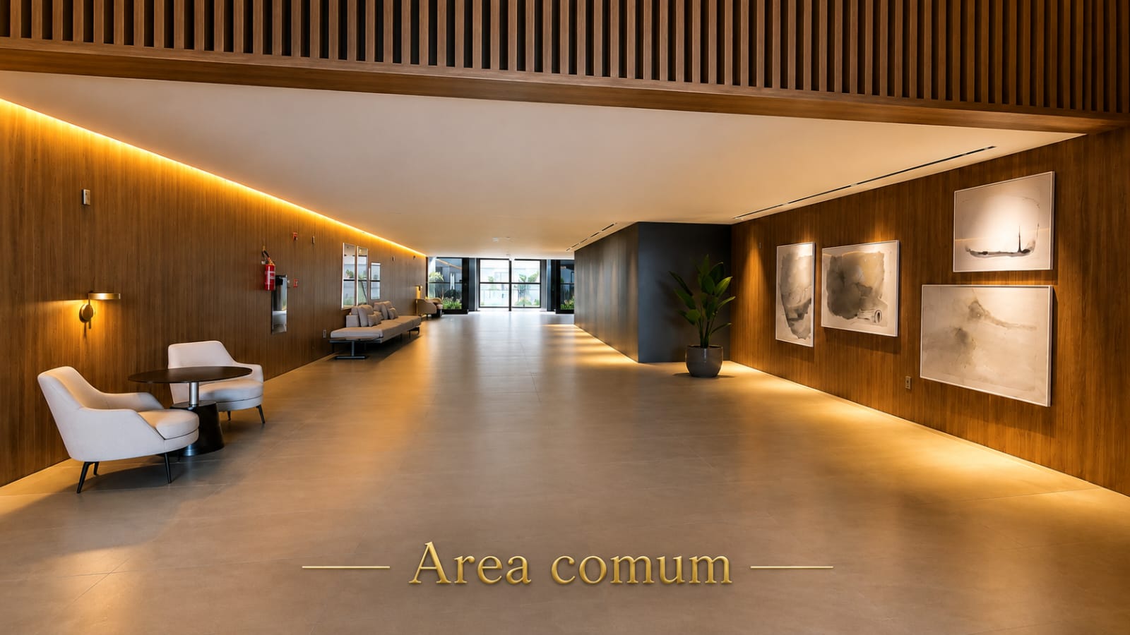 Foyer do condomínio com acabamento em madeira, forro rebaixado e iluminação indireta no Jardim Atlântico, Florianópolis.